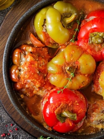stuffed peppers in tomato juice in a pot