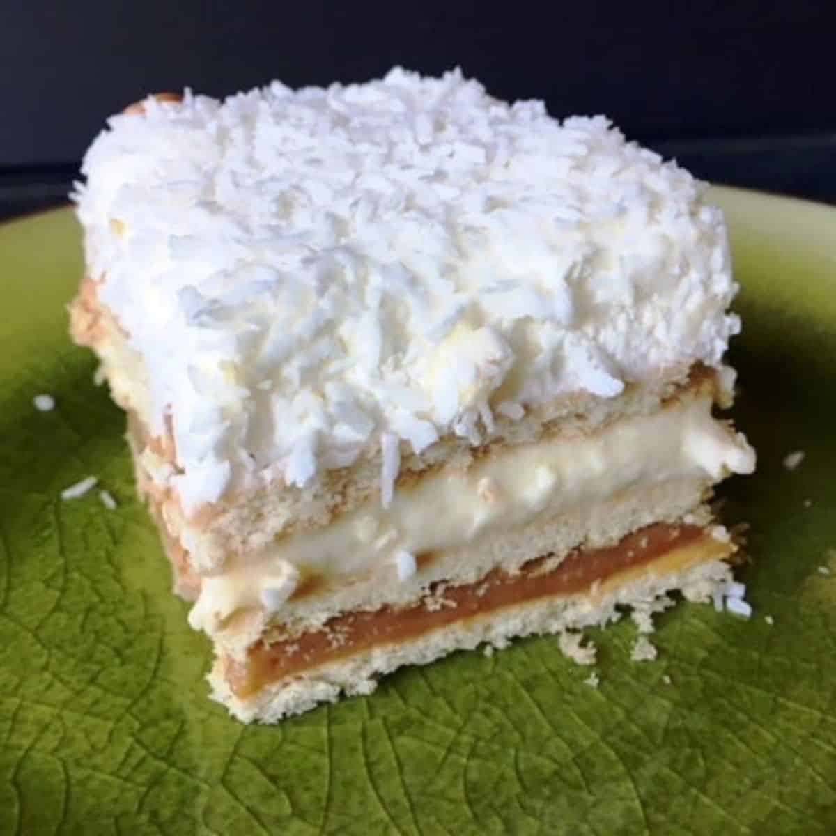 Raffaelo no bake cake on a green plate