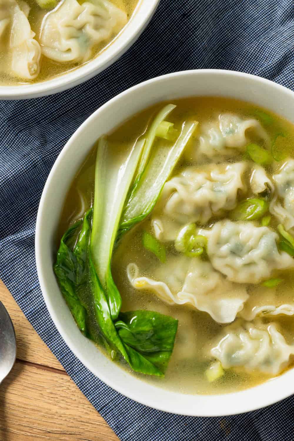 Chicken wonton soup in a bowl