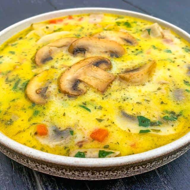 Creamy mushroom soup with fresh herbs